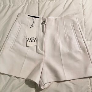 Women’s white shorts.